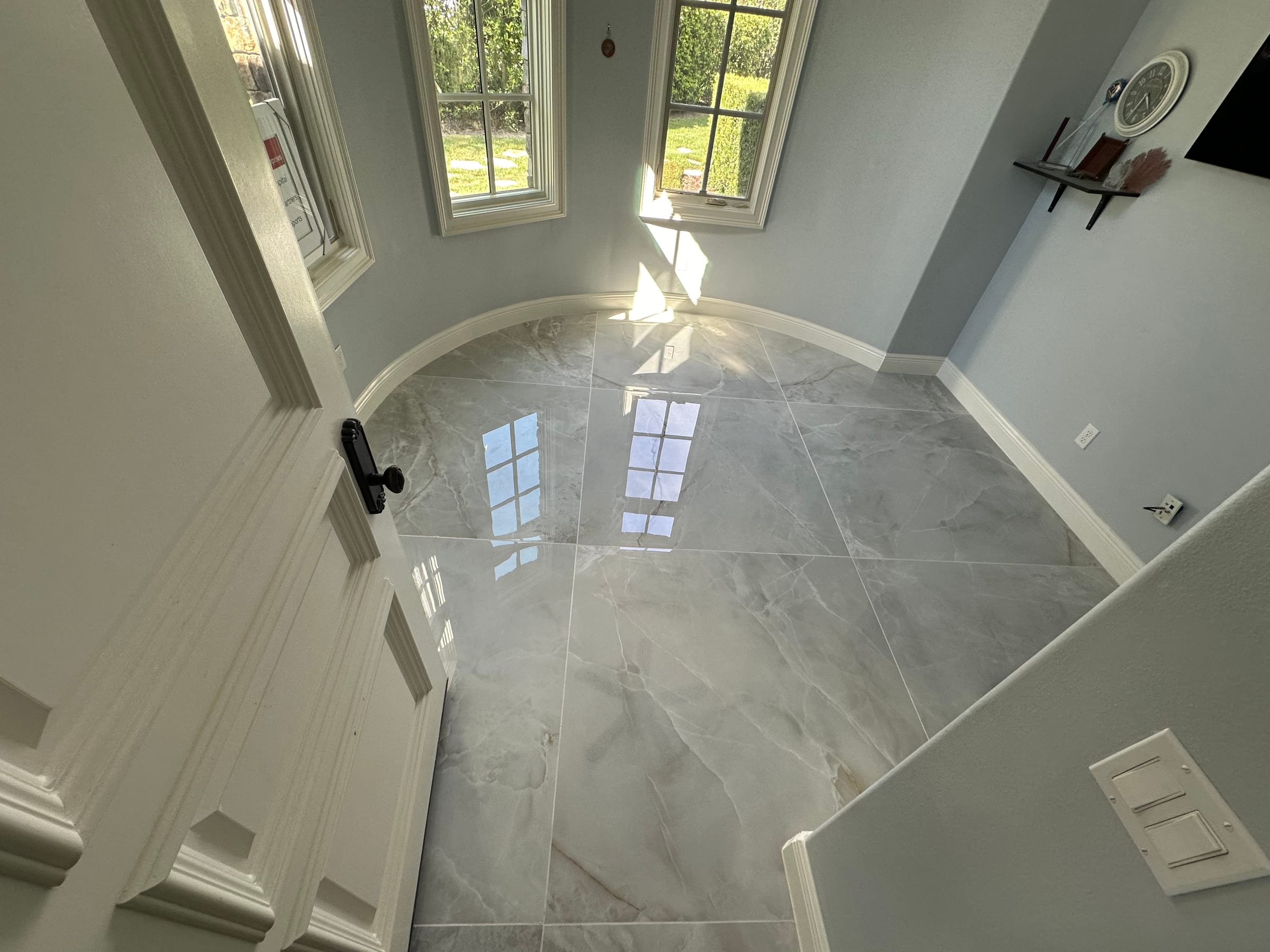 Finished interior with polished flooring by JEG Remodeling